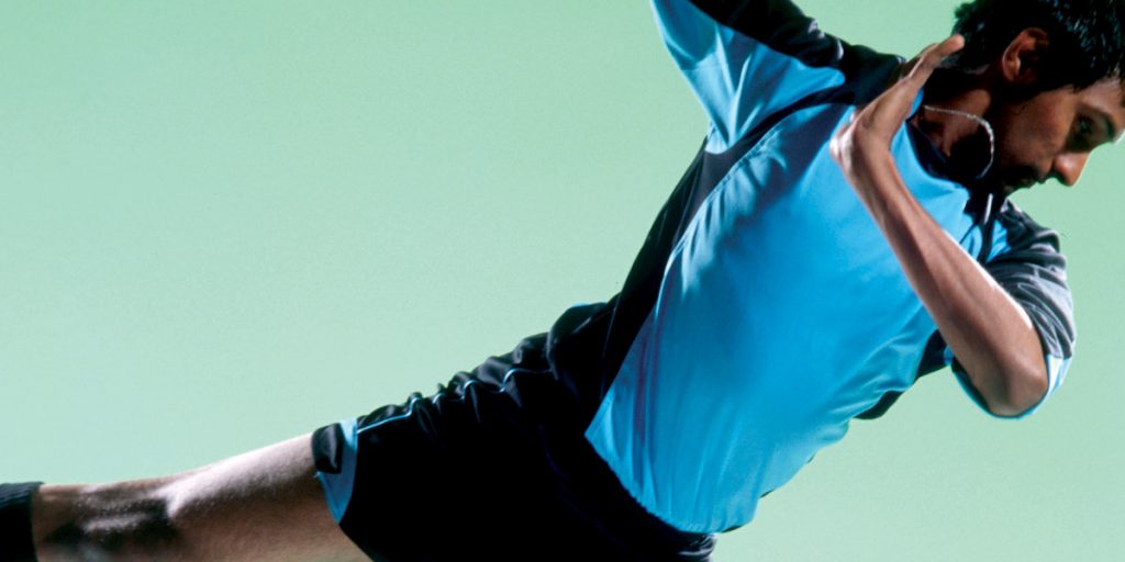 Male Bharatanatyam dancer wearning football costume